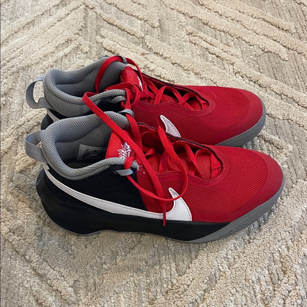 Red and Black High-Top Youth Nike Basketball Sneakers